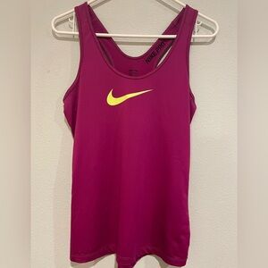Women’s Nike Pro dry fit Razorback long tank in a fun Raspberry color. S…